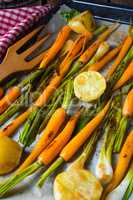 caramelised carrots, spring onions and baked potatoes