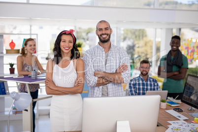 Team of executives standing together in the office