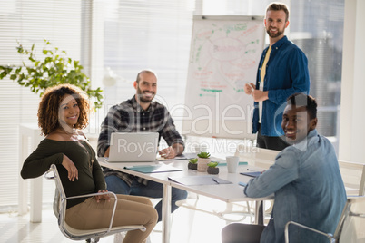 Team of executives in the meeting at office