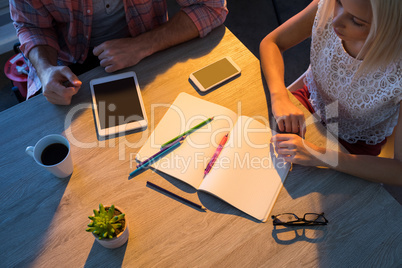 Executives interacting with each other during a meeting