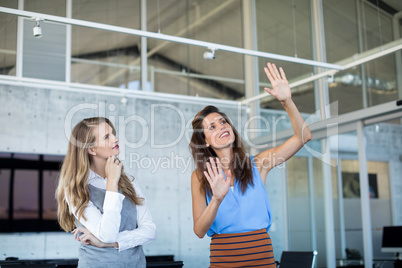 Female executives interacting with each other