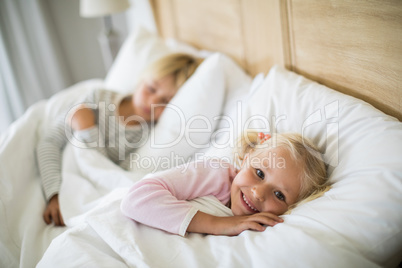 Girl sleeping in the bedroom