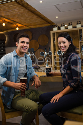 Portrait of friends having drinks at restaurant