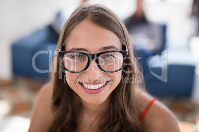 Smiling female executive in the office