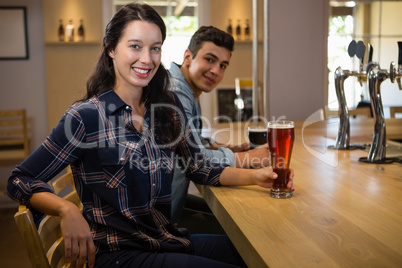 Portrait of friends at bar counter