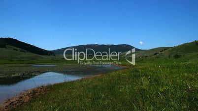 View of the Rascino Lake with the mountains around