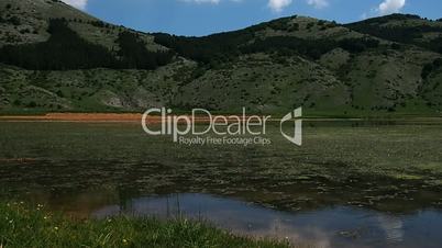 View of the Rascino Lake with the mountains around