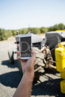 Hand holding mobile phone