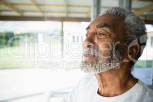 Senior man relaxing at home