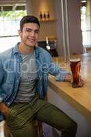 Portrait of handsome man with beer glass