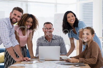 Team of executives working together in the office