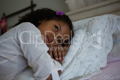 Girl lying on a bed in the bedroom