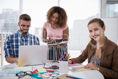 Team of executives working together in the office