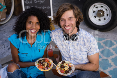 Portrait of happy couple having meal