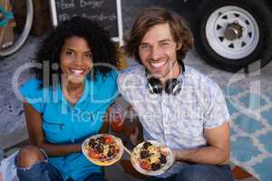 Portrait of happy couple having meal