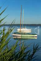 Still-life with boats at sunset light on the lake Balaton in Hun