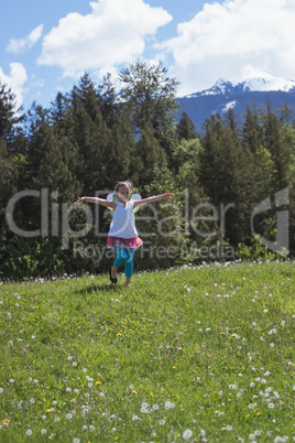 Excited girl running in park