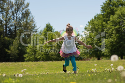 Excited girl running in park