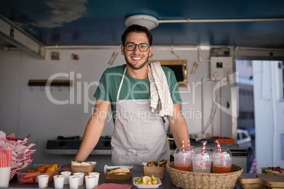 Portrait of waiter smiling