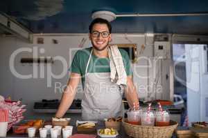 Portrait of waiter smiling