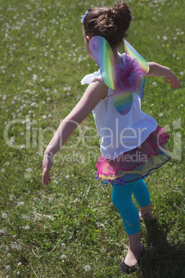 Girl playing on grass