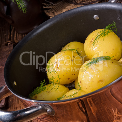 fresh boiled young potatoes with butter