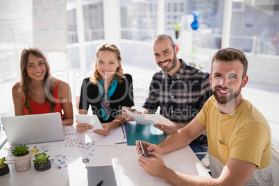 Portrait of business executives smiling Portrait of business executives smiling