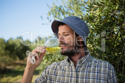 Man drinking a glass of wine