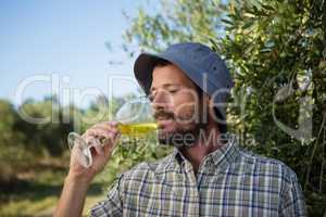 Man drinking a glass of wine