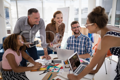 Team of executives working together in the office