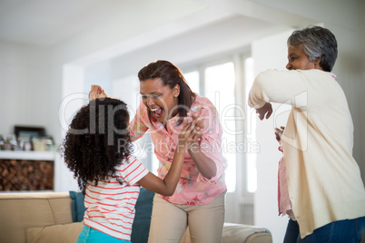 Happy family having fun in living room