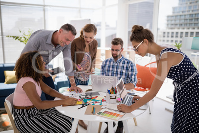 Team of executives working together in the office