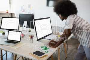 Man using computer while working at office
