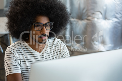 Concentrated man working at office