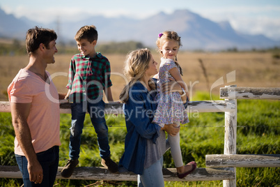 Happy family having fun in park