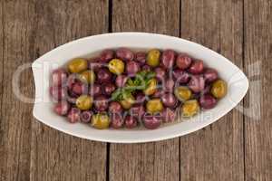 Overhead view of olives in plate