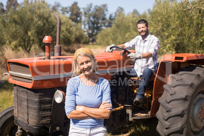 Portrait of happy couple in farm