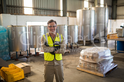 Portrait of happy technician standing with arms crossed Portrait of happy technician standing with arms crossed
