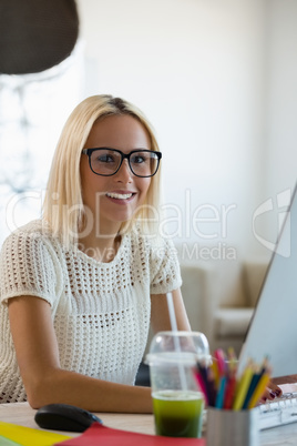 Portrait of woman with blond hair at office