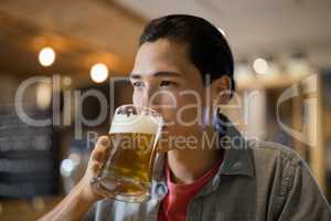 Man having beer in a restaurant