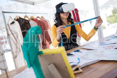 Female designer using virtual reality headset