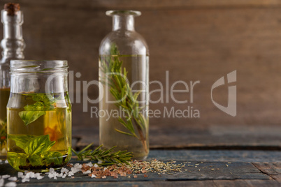 Spice by herb with oil in container