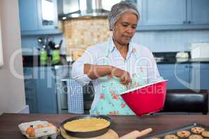 Senior woman preparing food