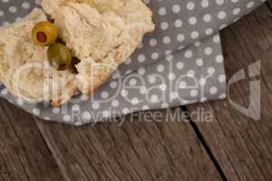 High angle view of olives with bread