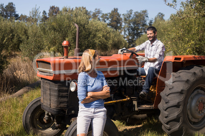 Couple interacting in olive farm