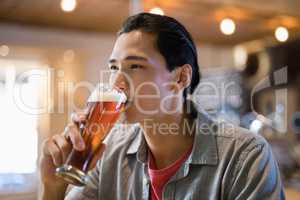 Man having beer in a restaurant