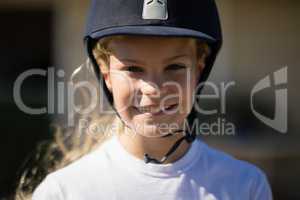 Rider girl smiling in the ranch