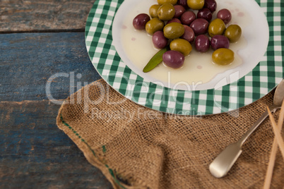 High angle view of olives served in plate