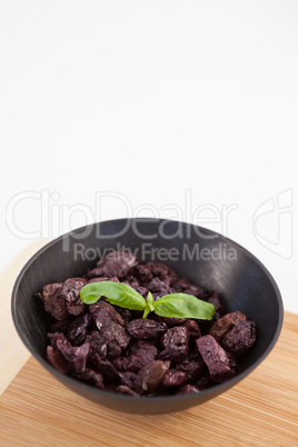 Close up of brown dried olives with herd