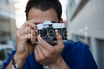 Man photographing with camera